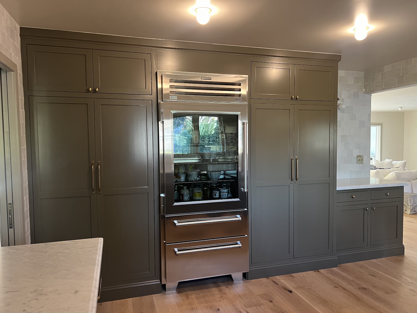 Green full-height cabinetry